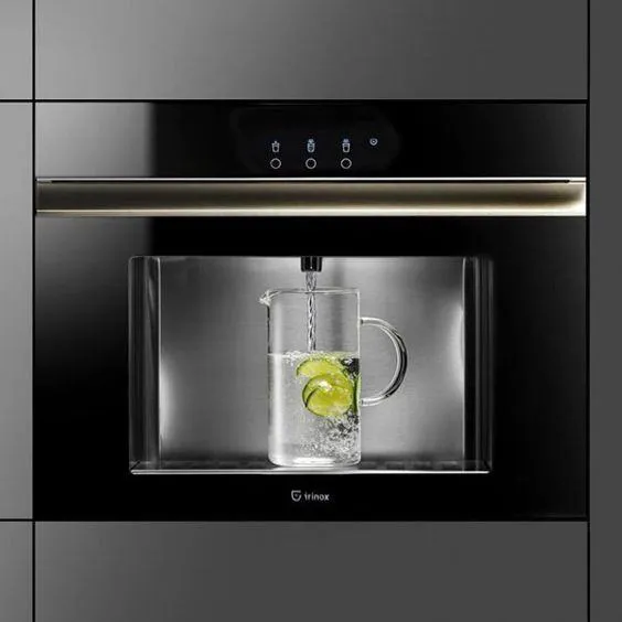 Built-in appliance with a lit glass compartment